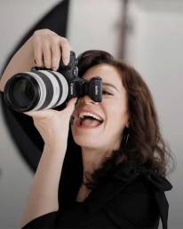 Denver headshot photographer Rachel Sorbet photographing a client.