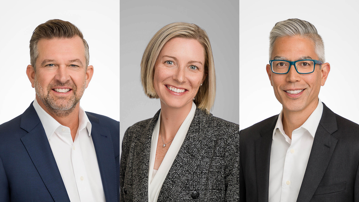 Three people photographed in the corporate headshot style showcasing Rachel Sorbet's quality of headshot photography.