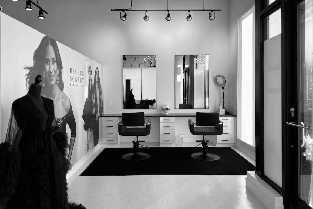 The hair and makeup station of the headshot studio with empty chairs ready to receive makeover and photoshoot clients.