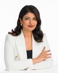 A portrait of a female attorney in a white business business blazer looking calm and confident photographed by award-winning photographer Rachel Sorbet.