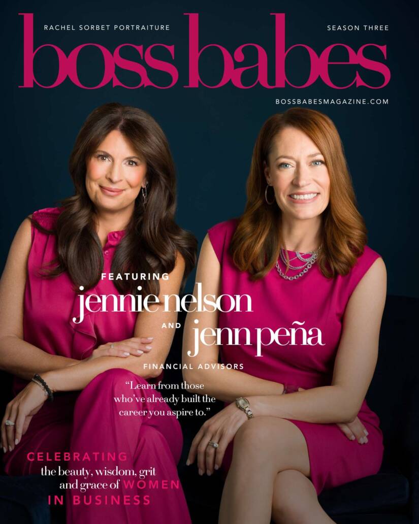 A portrait of two female financial advisors in Denver wearing hot pink suits