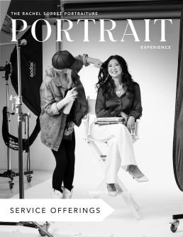 A midlife professional woman on set being styled for her branding photoshoot