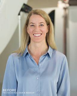 A portrait of a headshot client with a bare face before her makeover